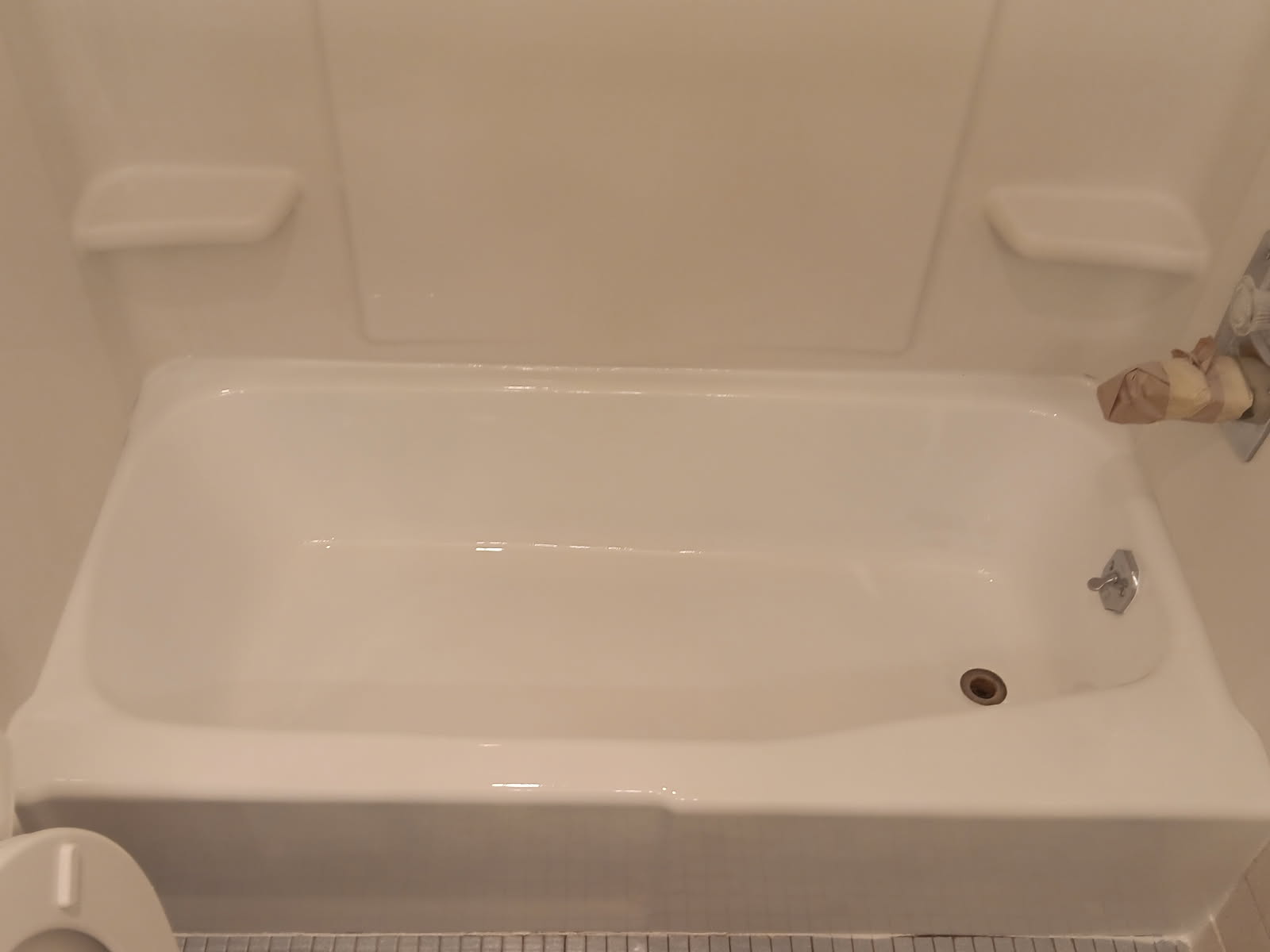 Gleaming white bathtub after refinishing